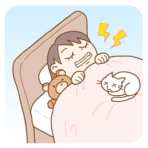 就寝中に歯ぎしりをする女性