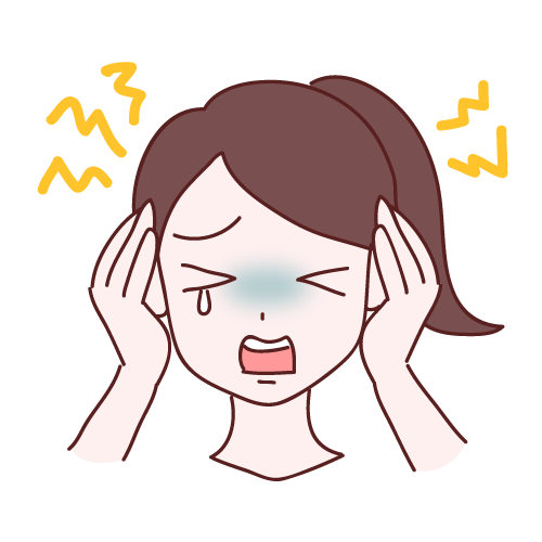 頭痛が起こり痛がる女性