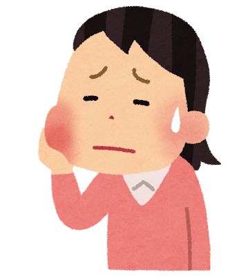 親知らずを抜歯して痛がる女性