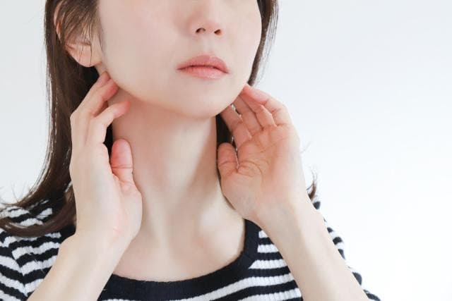 顎関節症の女性